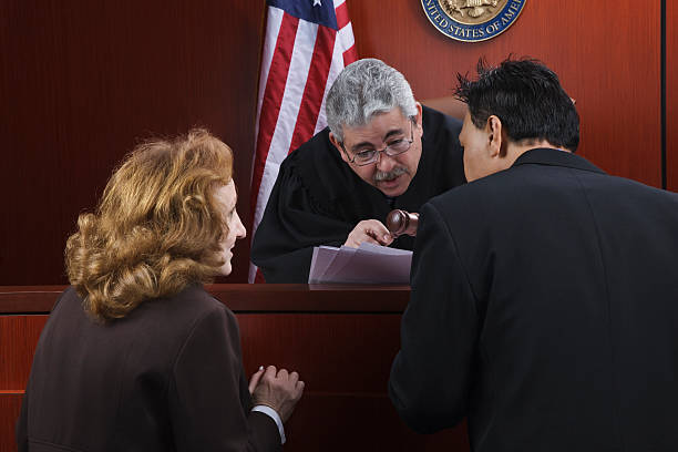 California court interpreter talking to a judge and a lawyerjpg
