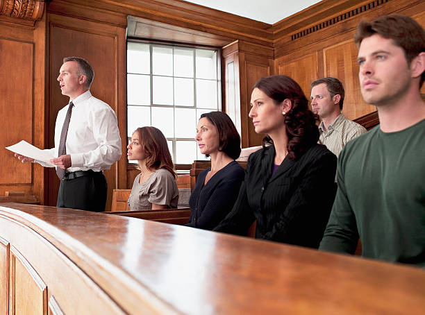 Lawyer addressing jurors in a courtroom, a setting where a federal court interpreter may be needed
