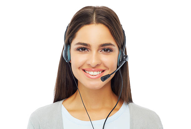Picture of an over the phone interpreter smiling with a headset